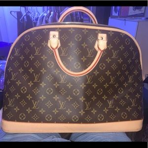 Louis Vutton Alma Voyage MM Monogram Tote Bag